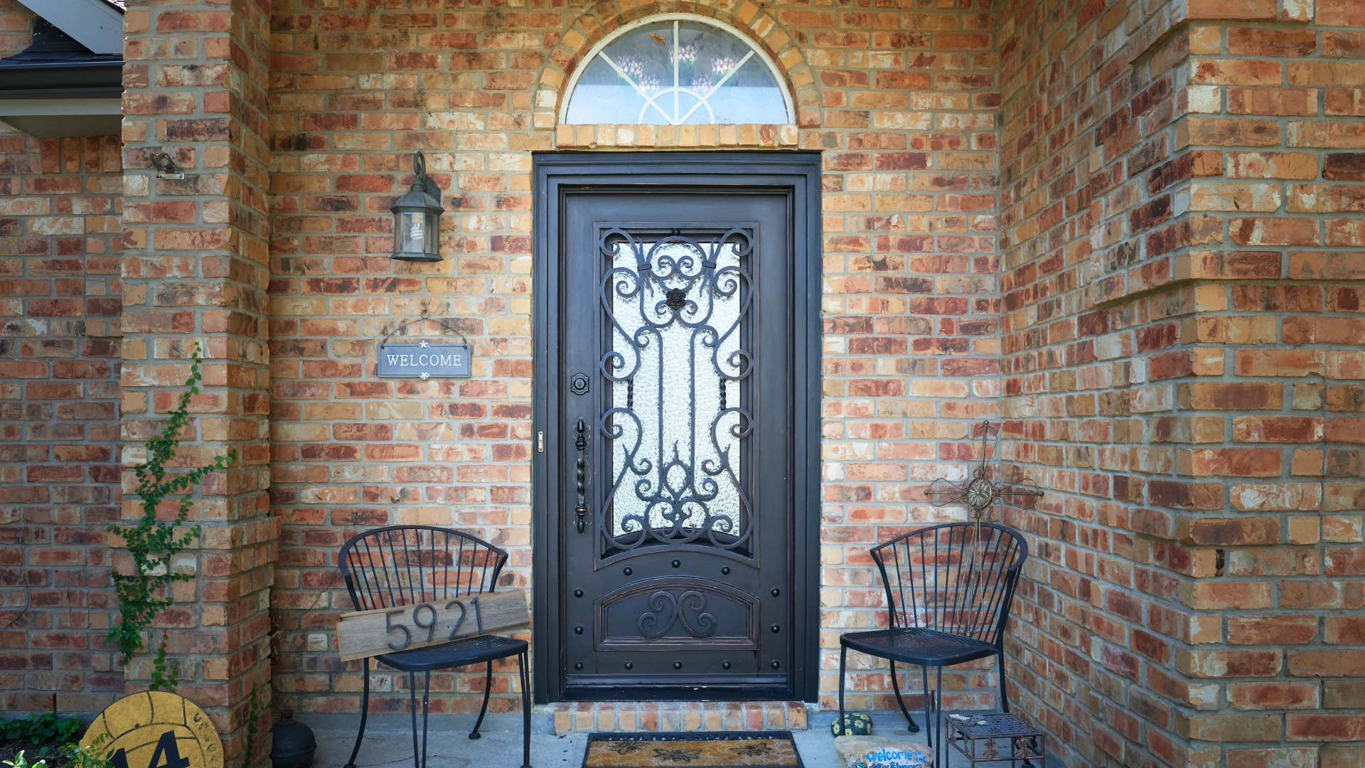 Vintage front door with welcome sign.